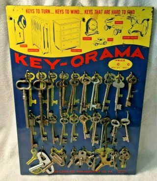 Vintage Taylor Lock Co Key - Orama Skeleton Key Tin Sign Store Display Clock Rare