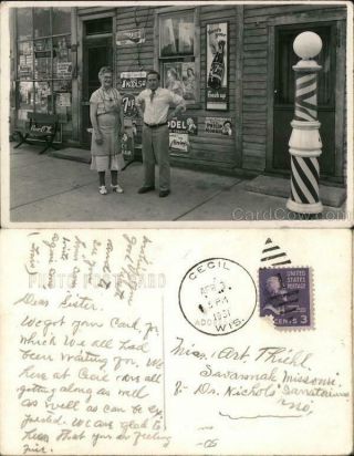 1951 Rppc Cecil,  Wi Couple Outside General Store,  Barber Pole Shawano County