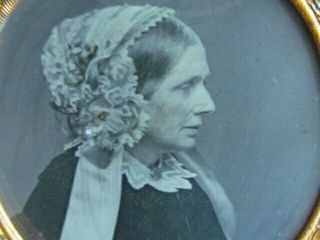 Side Profile Portrait Of A Victorian Woman Wearing A Bonnet Daguerreotype Photo