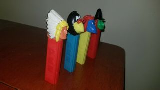 Vintage No Feet Pez Indian Chief,  witch,  female monkey,  and bird (crow?) 2
