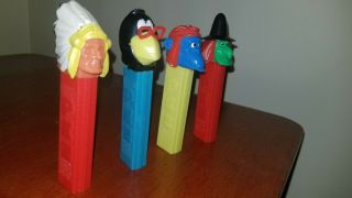 Vintage No Feet Pez Indian Chief,  witch,  female monkey,  and bird (crow?) 3