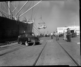 N358 1958 Negative.  Unloading European Cars From Cargo Ship,  Port Of Long Beach