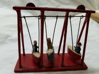 Erzgebirge vintage German hand carved swing with 3 boats and children 2