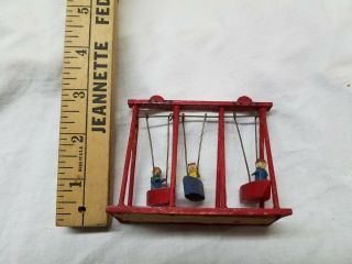Erzgebirge vintage German hand carved swing with 3 boats and children 4