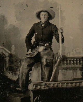 Awesome Image Of A Very Tough Looking Triple Armed Cowboy With Leather Chaps