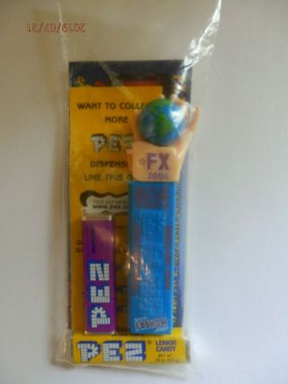 Pez Fx,  Hand Holding Earth (2006),  In Package