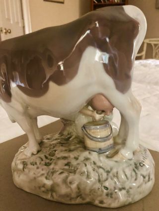 B&G Bing & grondahl Porcelain Maiden Milking Cow Figurine signed by Alex Locher. 4