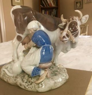 B&G Bing & grondahl Porcelain Maiden Milking Cow Figurine signed by Alex Locher. 5