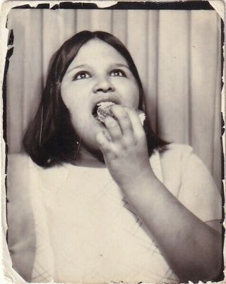 Vintage Photo Booth: Funny,  Pretty Young Girl,  Looking Up,  Eating A Hot Dog