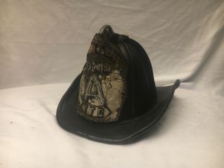 Antique Cairns leather fire helmet with Transitional finial. 2