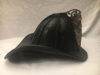 Antique Cairns leather fire helmet with Transitional finial. 3