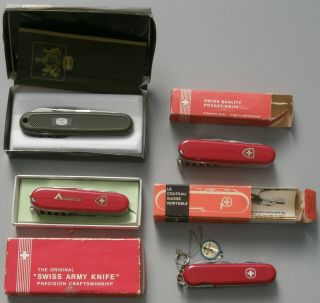 3 VICTORINOX 1 WENGER: 4 SWISS KNIVES pre - 1991 NIB,  2 OUTDOORSMAN,  MAUSER by VIC 3