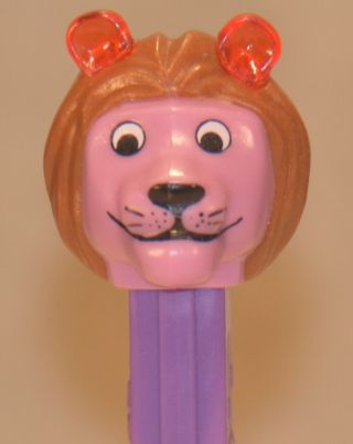 Pez Misfit Lion With Purple Face,  Brown Hair,  Crystal Red Ears