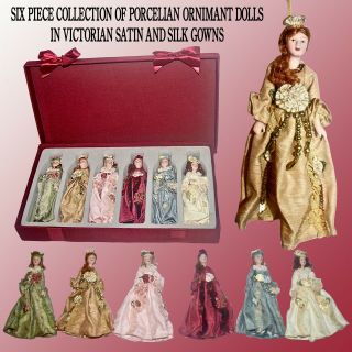 Set Of 6 Porcelain Doll Ornaments Dressed In Fancy Gowns In A Satin Covered Case