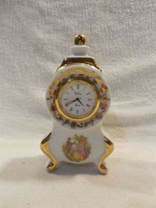 Imperia Limoges France Porcelain Miniature Victorian Couple Quartz Clock 4 1/2 "