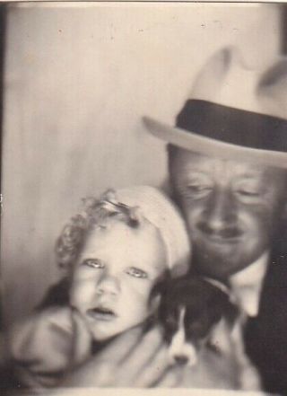 Vintage Photo Booth - Father & Unsure - Looking Daughter Holding Young Puppy Dog
