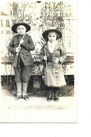 Real Photo Rppc Young Military Soldier Boy Holding Gun Young Girl Patriotic Flag