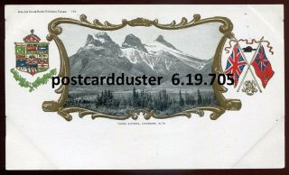 705 - Canmore Alberta 1900s Three Sisters.  Patriotic Flags Beaver By Warwick