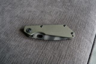 Strider Knives Sng,  Flamed Titanium,  Tiger Striped Blade Cpms30v Coyote Scales
