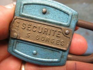 Very unusual old push key padlock lock SECURITE F.  T.  H.  with the key.  nr 2