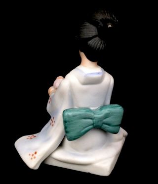 Bisque Porcelain Geisha with Flowers Figurine. 3