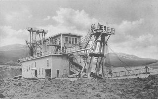 Derry Gold Mining Dredge Near Leadville,  Co Mt Massive In Bkgd Davis Drug Co