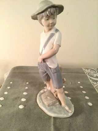 Nao By Lladro Boy Up To Mischief With Hat & Sling Shot & Book Bag Porcelain