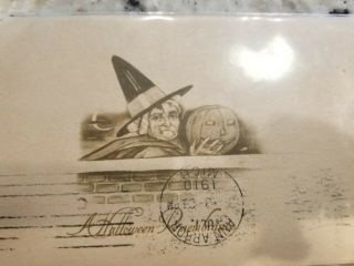 1910 Gibson Halloween Witch Holding Jol Pumpkin Postcard Dated 1910