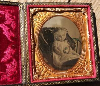 Post - Mortem Tintype Baby in Carriage Holding Flower & Rattle 2