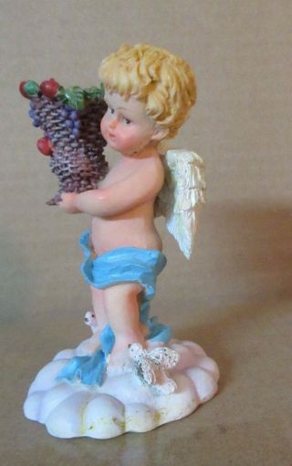 Bare Bottom Little Boy Angel Figurine - Holding a basket for a Small Candle 3