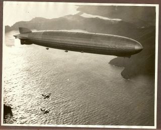 1929/30 Press Photo German Dirigible Graf Zeppelin Flying Over A Coastline