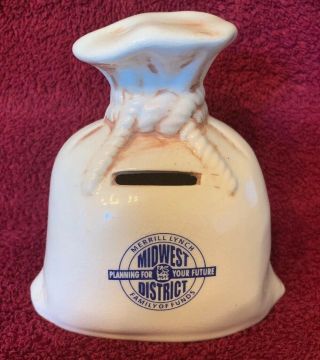 Vintage Merrill Lynch Midwest District Ceramic Money Bag Coin Bank.  Made In Usa