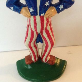 Vintage /Antique Cast Iron Uncle Sam Door Stop Bright Red,  White and blue 9 