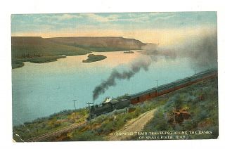 150 - Trains & Railroad - Usa - Idaho - Express Train Traveling Along The Banks Of Sn