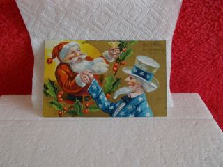 EXTREMELY RARE & DESIRABLE SANTA CLAUS/UNCLE SAM VINTAGE CHRISTMAS POSTCARD,  USE 2