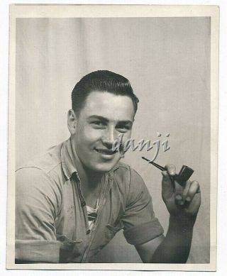 Handsome Young Muscle Man Smoking A Pipe And Smiling At The Camera Old Photo