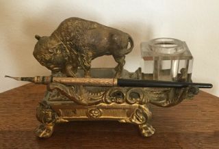 Antique Cast Brass Inkwell With Buffalo And A Pen