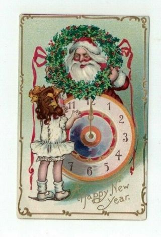Antique 1909 Embossed Tuck Year Post Card Santa Clock Little Girl Wreath