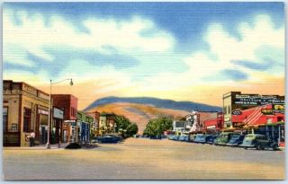Cody,  Wyoming Postcard " Main Street & Business District " Sanborn Linen C1940s