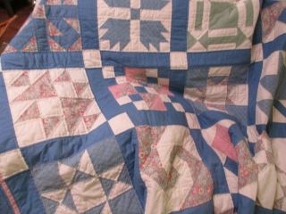Handmade Quilt - Blue Pink And White Sampler Quilt.  Pink Border Hand Quilted Twin