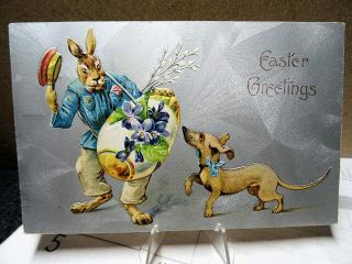 1909 Embossed Postcard Easter Humanized Rabbit With Egg Basket And His Dog