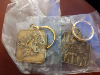 (2) Vintage Snap On Tools Old Logo Brass Key Ring Fob Man Running With Wrench