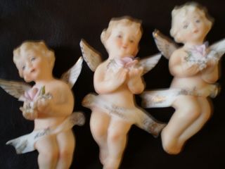Three Vintage Small Porcelain Angels Cherubs Holding A Rose 2476s W/lefton Tag