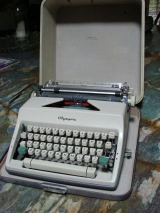 1966 Olympia Cursive/ Script Typewriter With Case.  One Owner