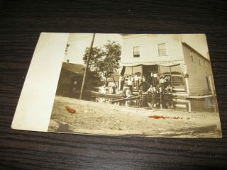 People In Front Of Saloon And Creek Post Card Wisnka Studio.  Circa 1912 Oconto Wi