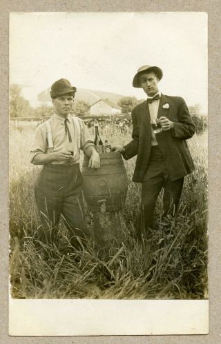 Vintage Rppc Real Photo Postcard Young Men In A Field Drinking