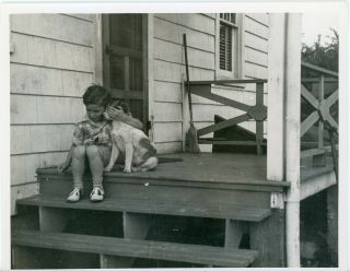 Very Sweet Vintage Photo Of A Child Sitting On The Porch Holding His Dog