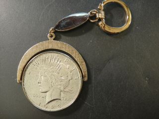 Gold Plated Key Chain W/1923 United States Peace Silver Dollar.  Swivel Mount.