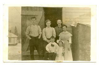 Rppc Family In Their Suspenders,  And Best Dresses,  Boy With Tie,  Girl With Doll