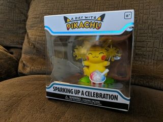 Funko A Day With Pikachu: Sparking Up A Celebration Pokemon Center In Hand Funko